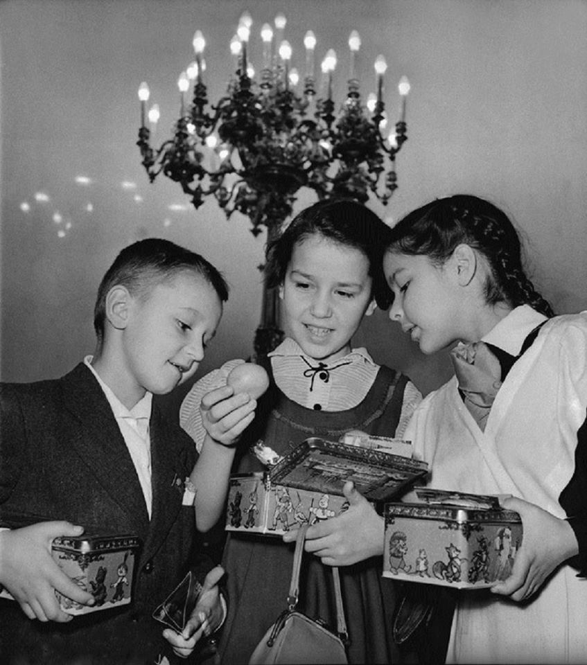 Children with candy boxes (traditional New Year gifts in the USSR)