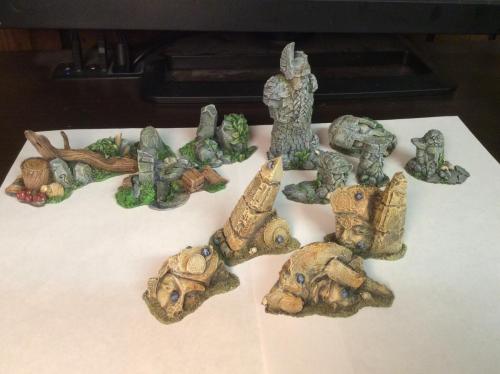 A dozen terrain elements I painted over the weekend. These are...