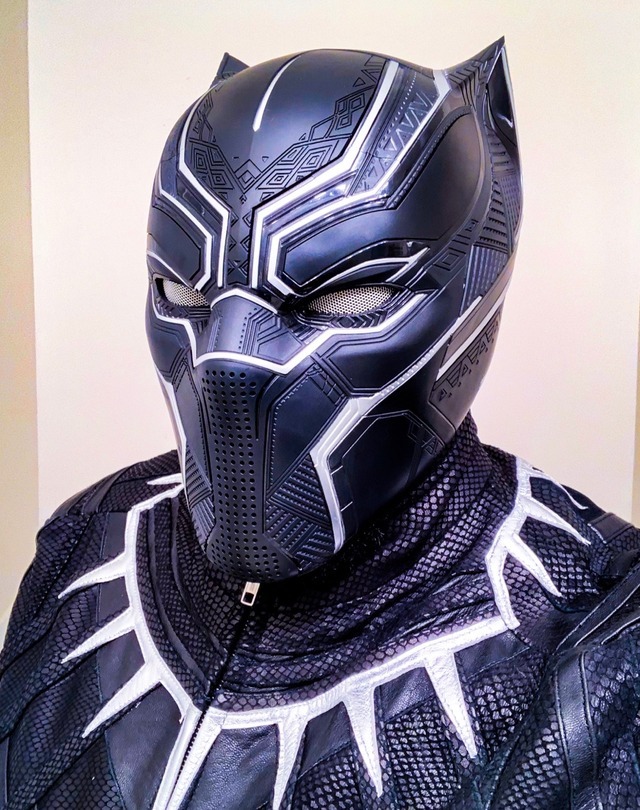 black panther holding helmet