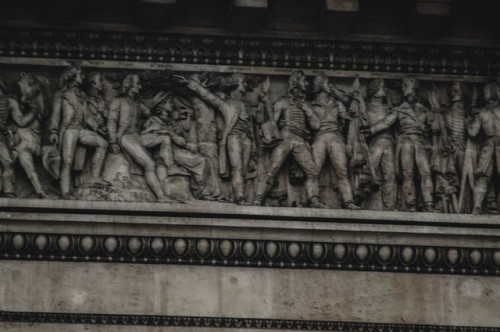 Detail on the wall of Cour Napoléon et Pyramide du Louvre.