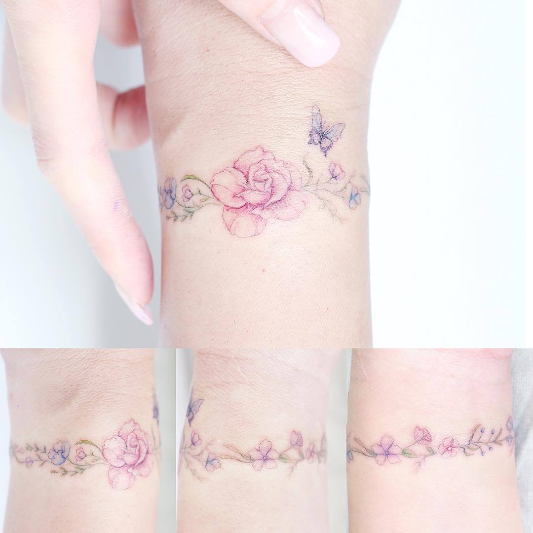 TATTOOS.ORG — Flower & Butterfly Arm Band Tattoo Artist:...