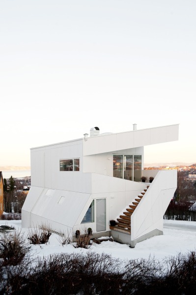 ombuarchitecture:<br /><br />Polite House Architecture<br />Located in the residential area of ​​Havstein in Trondheim, Norway, this house overlooks the fjord and the city. Thinking JVA, this house geometric shapes stands out for its uniqueness and modernity. <br />via fubiz<br /><br /><br />