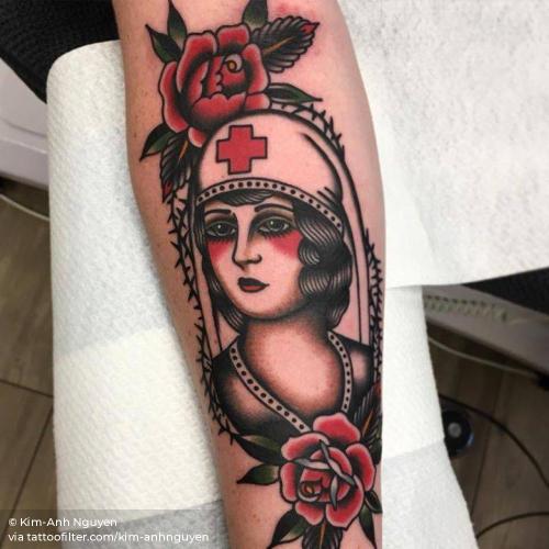 Traditional Nurse Face With Rose Tattoo On Left Thigh