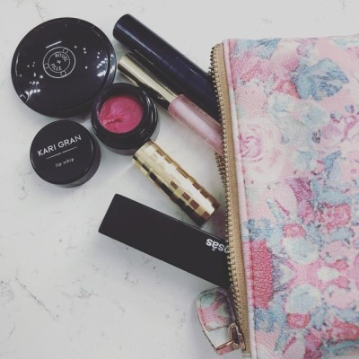 thought i’d show you what’s spilling out of my makeup bag this week