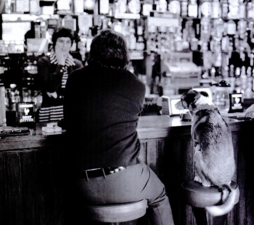 dropboxofcuriosities:Erich Hartmann - Man, dog and barmaid in a...