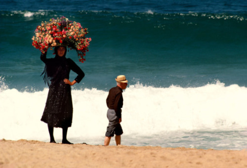 dolm:Portugal. 1985. Strolling the beach at Nazare. Bruno...