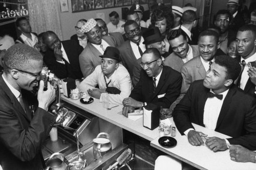 twixnmix:Muhammad Ali celebrating with Malcolm X at the...