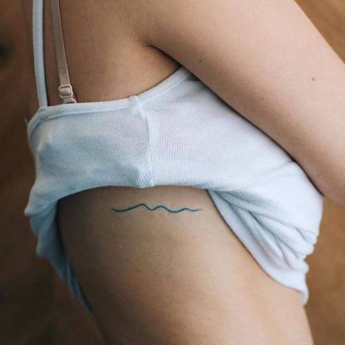 By Kalula, done in Melbourne. http://ttoo.co/p/101104 small;kalula;line art;rib;tiny;wave;hand poked;ifttt;little;nature;ocean;fine line