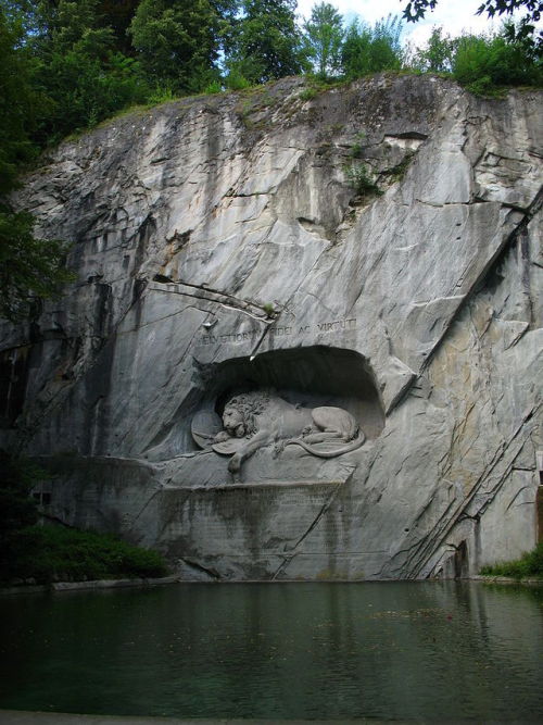 sixpenceee:The Lion Monument is a rock relief in Lucerne,...