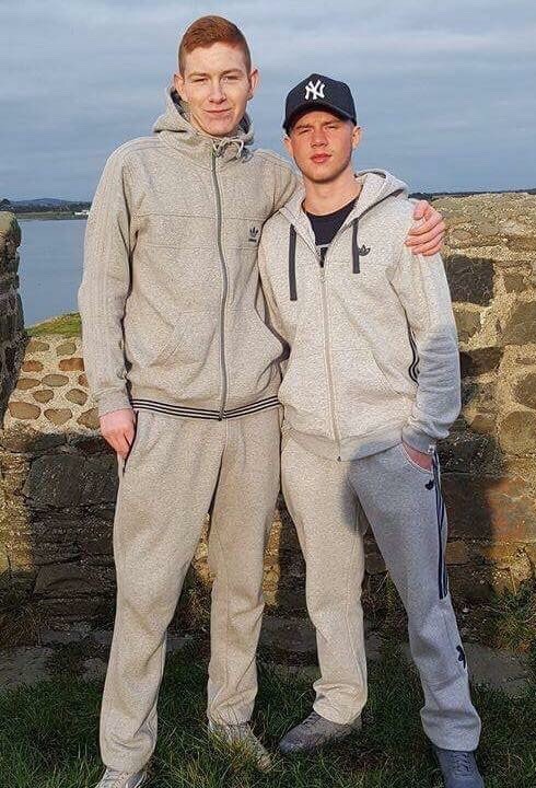 men in grey trackies