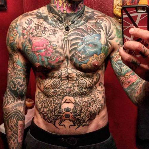 HEAVILY TATTOOED