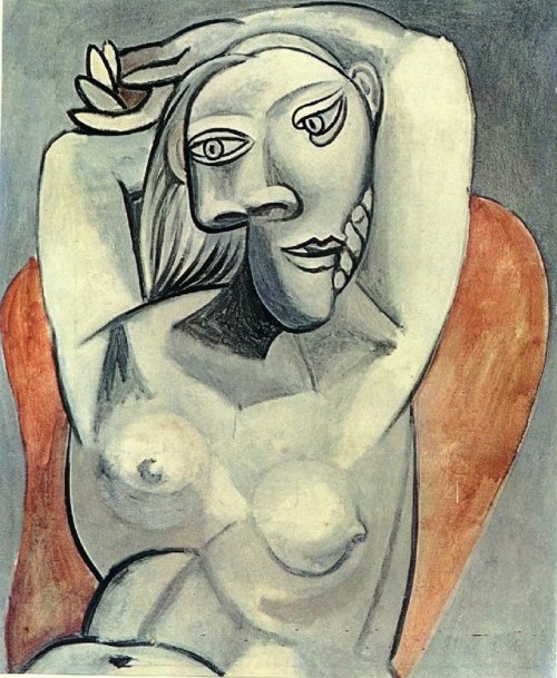 artist-picasso:Woman sitting in red armchair, Pablo...