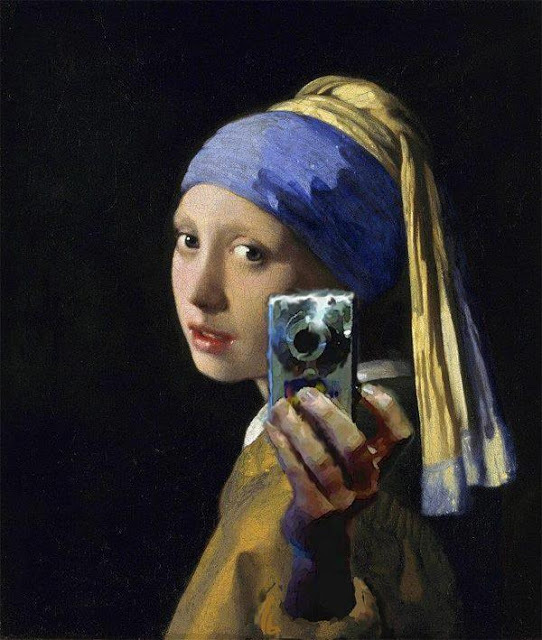 **Girl with a Pearl Earring Selfie**  >The Vermeer mashup represents one of the internet