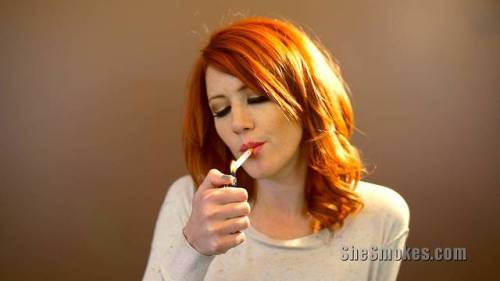 kccouple4bigf:Ya gotta love a smokin redhead 