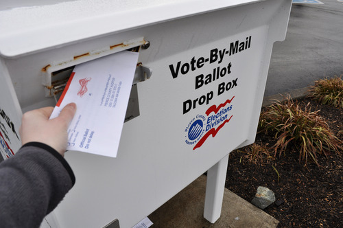 ballot being dropped in box