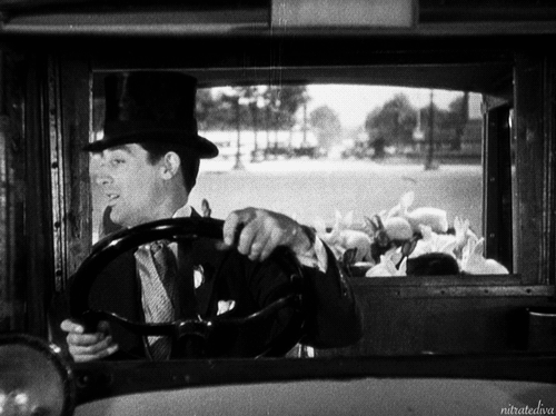 nitratediva: “Cary Grant y un carro cargado de conejitos en Kiss and Make-Up (1934).  "