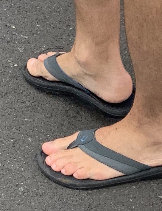 male feet in flip flops