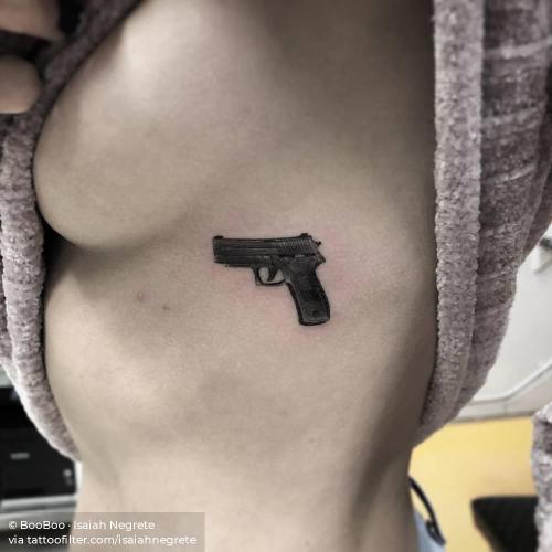 By BooBoo · Isaiah Negrete, done in West Hollywood.... facebook;gun;isaiahnegrete;military;profession;rib;single needle;small;twitter;weapon