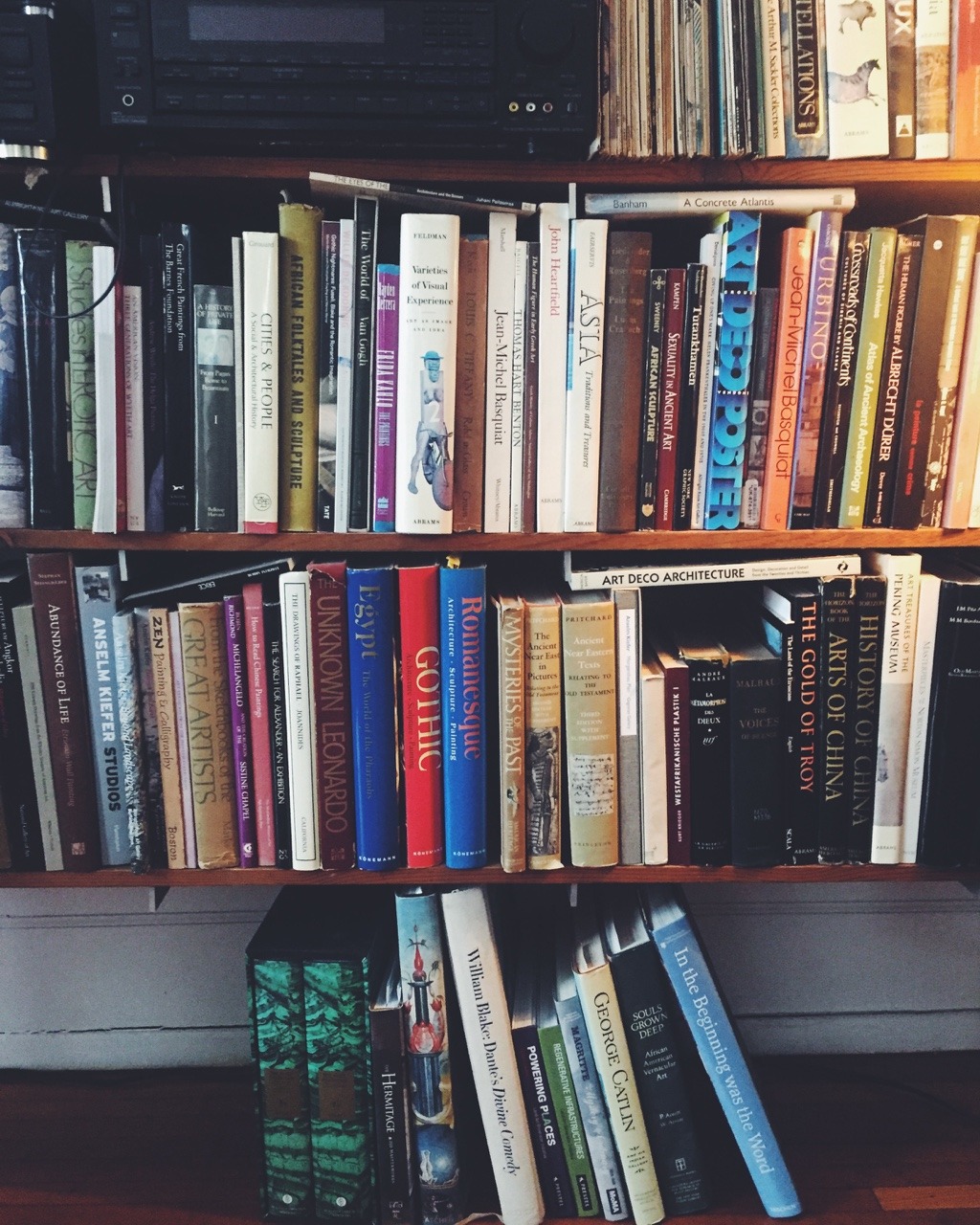 I grew up surrounded by stacks and stacks of... | While Reading and Walking