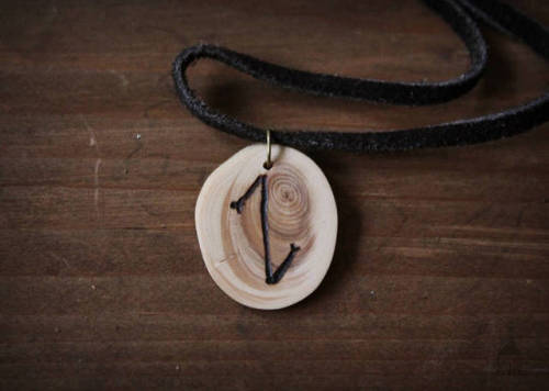 loitsucrafts:Wooden rune necklaces bearing the viking runes...