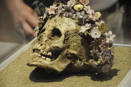 sixpenceee:Girl buried with a crown of ceramic flowers. Patras,...