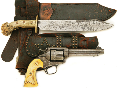 peashooter85:Relief engraved ivory handled Colt Bisley with...