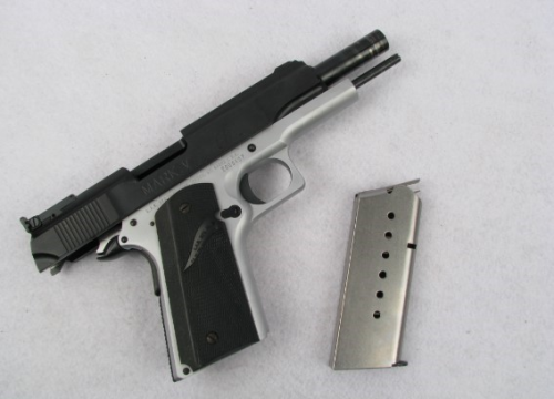 gunrunnerhell:LAR GRIZZLY 50A very rare model of the LAR...