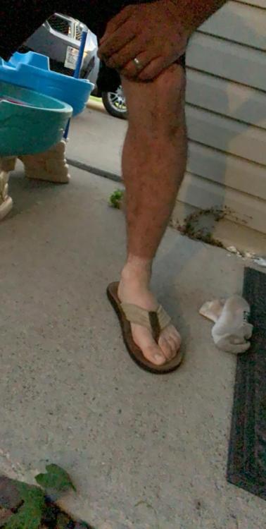 My husbands first time wearing sandals since starting his new...