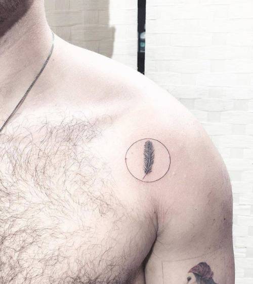 By MJ, done at Bedford Tattoo, Brooklyn. http://ttoo.co/p/35979 mj;geometric shape;small;circle;tiny;native american;feather;ifttt;little;minimalist;shoulder