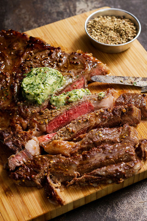 daily-deliciousness:Grilled ribeye steak with melting parsley...