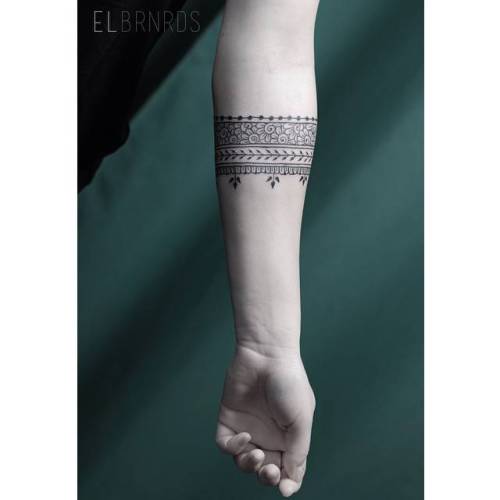 Ornamental style arm band tattoo on the left forearm. Tattoo... arm band;band;black;ornamental;forearm;tatuaje;tatuajes;medium size