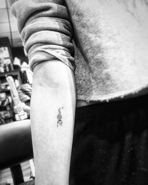 By Jin · Hoa Eternity, done at Moon Sheen Tattoo, Manhattan.... small;jin;micro;line art;candle;tiny;ifttt;little;minimalist;inner forearm;other;fine line