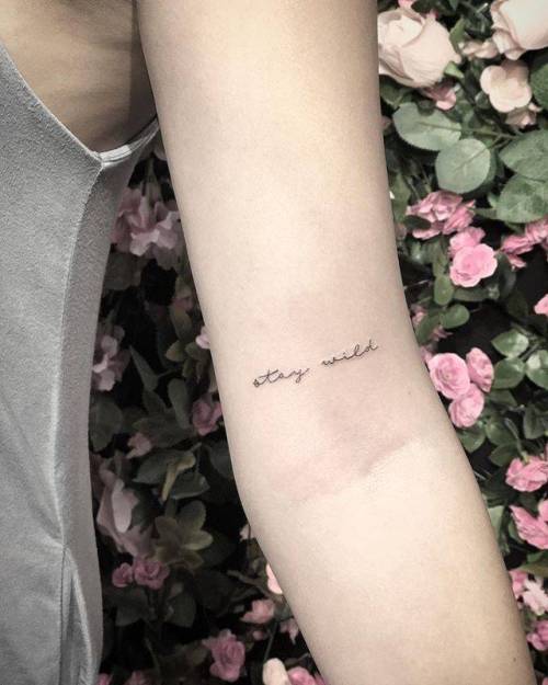 By MJ, done at West 4 Tattoo, Manhattan. http://ttoo.co/p/36017 mj;small;bicep;line art;languages;tiny;ifttt;little;english;minimalist;quotes;english tattoo quotes;fine line;stay wild
