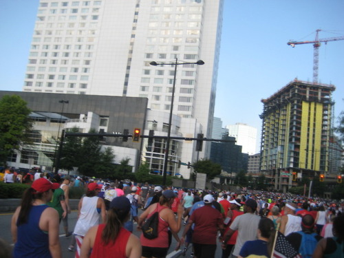 2018 Peachtree Road Race (Atlanta) Start. Holy Water Spray and...