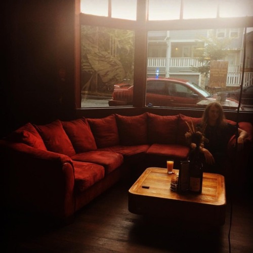 The couch here matches my car parked outside lol #barebonescafe...