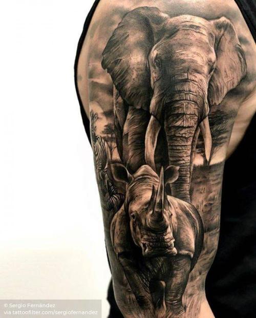 By Sergio Fernández, done in Barcelona. http://ttoo.co/p/35335 animal;big;black and grey;elephant;facebook;good luck;other;rhino;sergiofernandez;twitter;upper arm