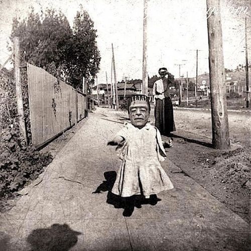 ronaldcmerchant:a little girl in a Frankenstein mask-circa...