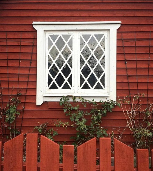red cabin via old farmhouse