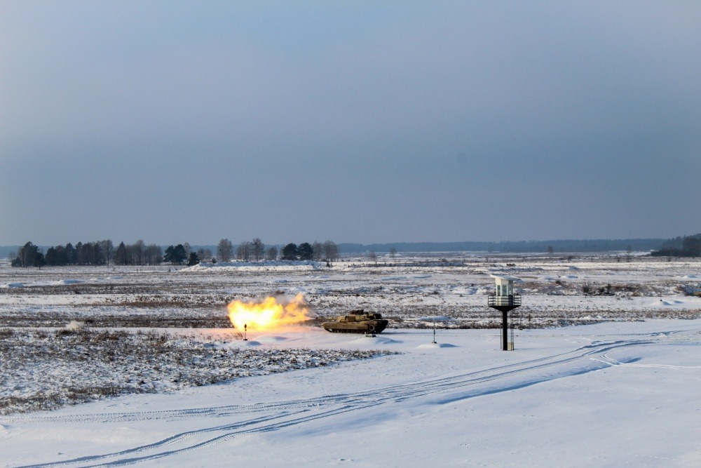 Battle Group Poland preforms winter live fire training during Operation Raider Lightning at Bemowo Piskie Training Area, Poland, Jan. 16. Battle Group Poland is a unique, multinational coalition of U.S., U.K., Croatian and Romanian Soldiers who serve...