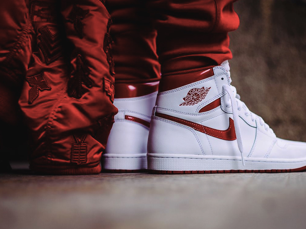 jordan 1 metallic red on feet