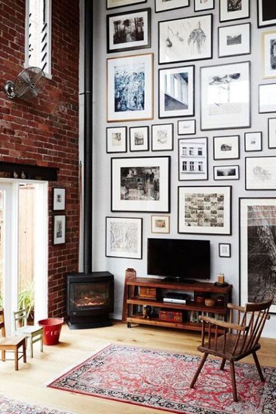 Have really high ceilings? Break out the ladder and let your art climb the walls.