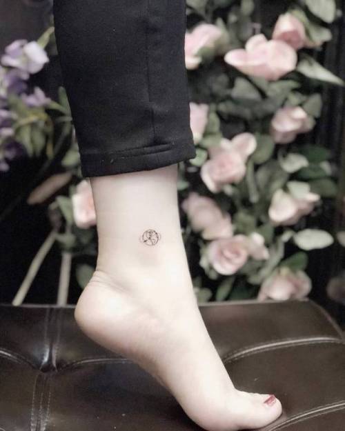 By Wicky Nicky, done at West 4 Tattoo, Manhattan.... small;astronomy;micro;wickynicky;planet;tiny;ankle;ifttt;little;minimalist;earth