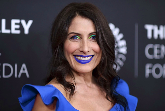 Lisa Edelstein's face, with bright makeup photoshopped on