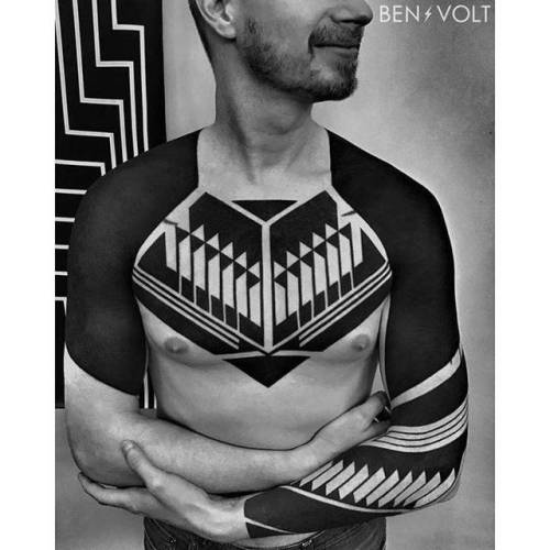 By Ben Volt, done at 7th International Nepal Tattoo Convention,... chest;huge;blackout;benvolt;facebook;blackwork;twitter;shoulder;sleeve;geometric;upper arm