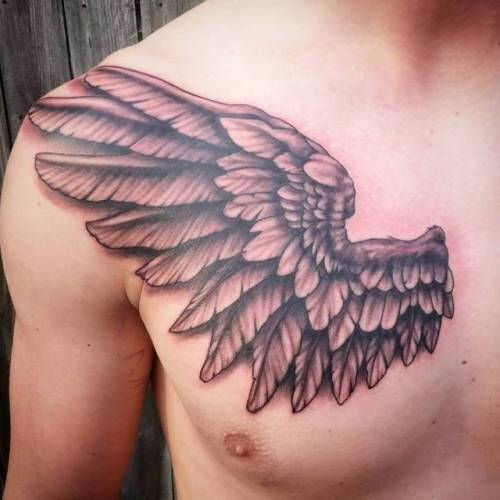 By Jesse Vardaro, done at Fable Tattoo Gallery, Richmond.... black and grey;wing;big;chest;facebook;twitter;religious;jessevardaro