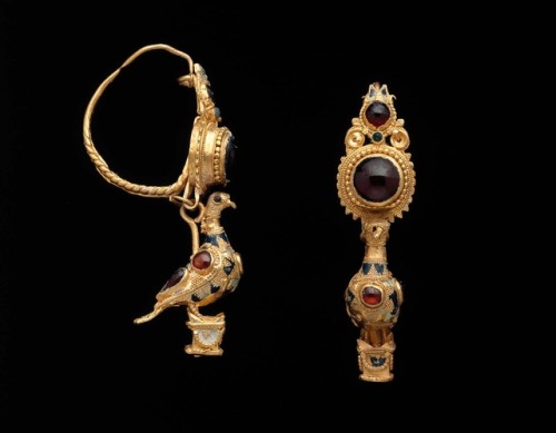 theancientwayoflife:~ Earring with a dove standing on an...