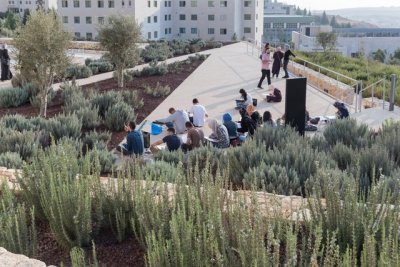 archatlas:<br />Palestinian Museum in Birzeit<br />The landscape of the Palestinian Museum by Heneghan Peng has the ‘worked’ quality of a city; every element of it has been touched and tells a story of intervention, production, culture, environment, commerce. Like a city, the terraced landscape has embedded within it its history. The approach to the Palestinian Museum is to draw on this history of the terraced landscape, embedding the museum into its immediate site and drawing from this site to tell a larger story of a diverse culture.<br />The cascade of terraces tells a diversity of stories, citrus brought in through trade routes, native aromatic herbs, a rich and varied landscape with connections east and west. The building itself emerges from the landscape to create a strong profile for the hilltop both integrated into the landscape yet creating an assertive form that has a distinctive identity.<br /><br /><br />Follow the Source Link for images sources and more information. <br /><br /><br />