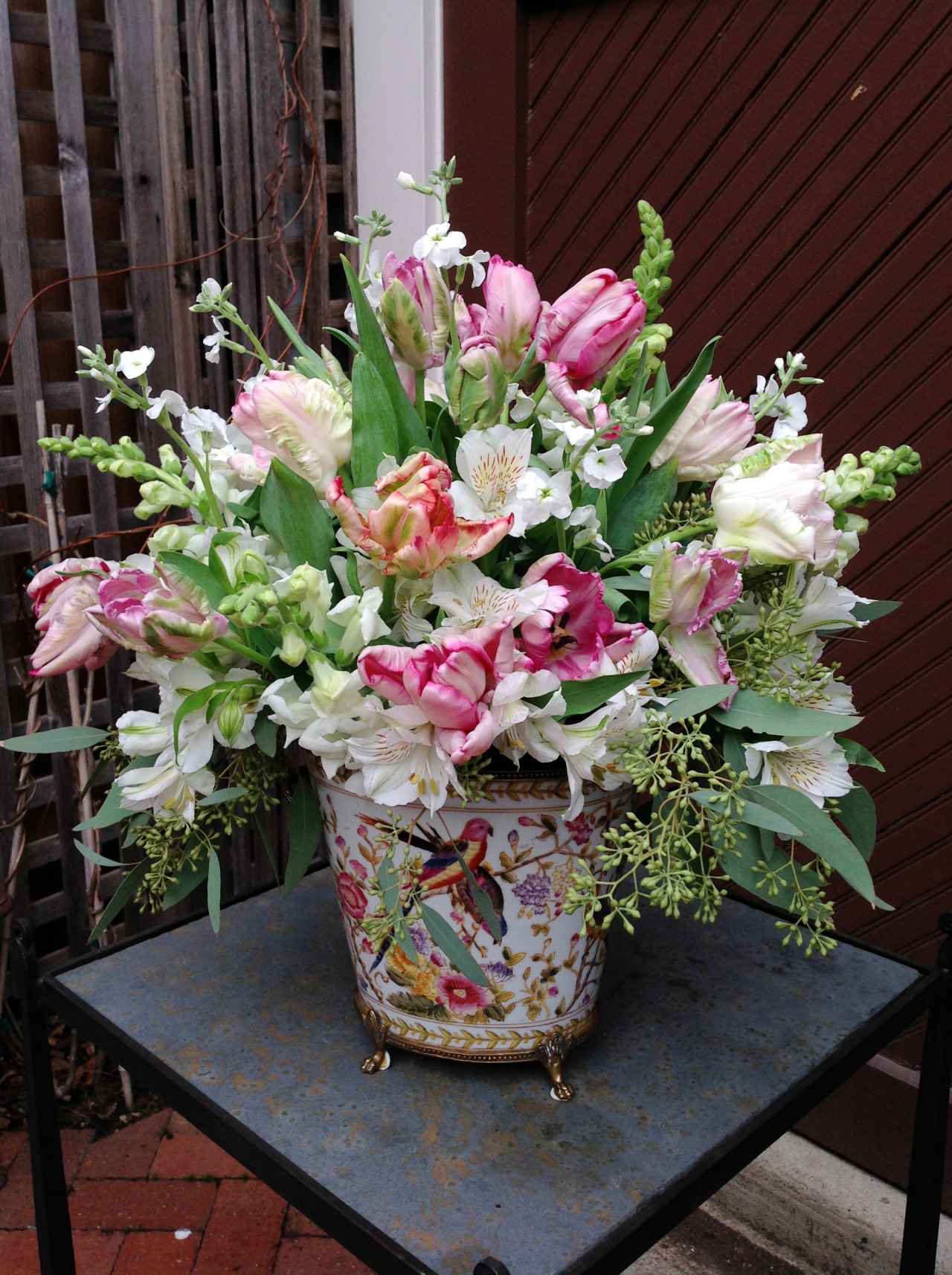patriciaberl: âLush pink, creme, and green parrot tulips create an elegant arrangement in a classic french vase. April 2014. â