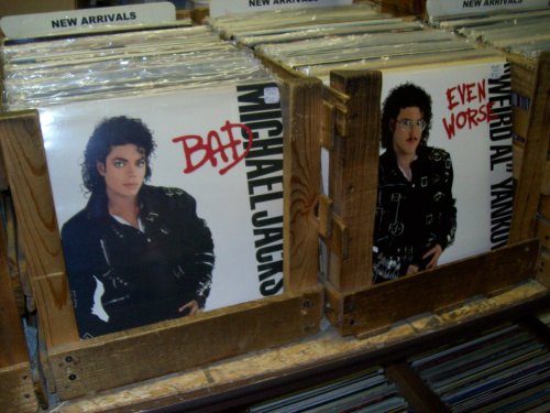 punnysher:viralthings:Al Yankovic’s Album on Sale next to...