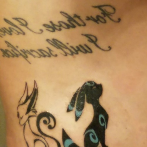 Got an umbreon and espeon tattoo yesterday. It looks weird...